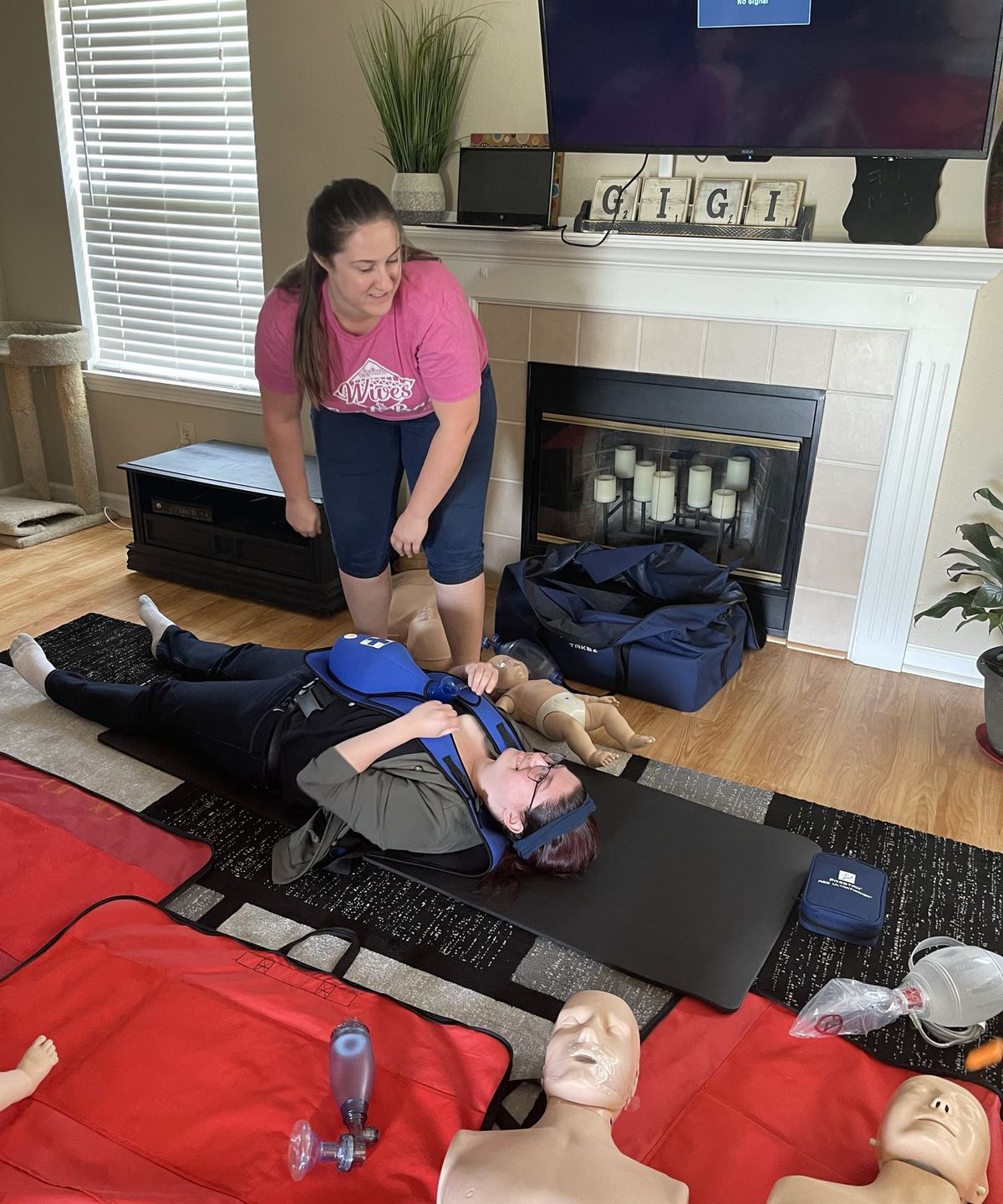 A choking rescue demonstration during an in home CPR class
